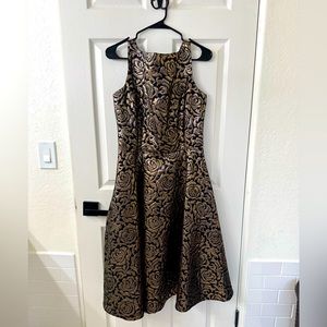 Viva Las Vegas Bettie Page by Tatyana gold and black dress.